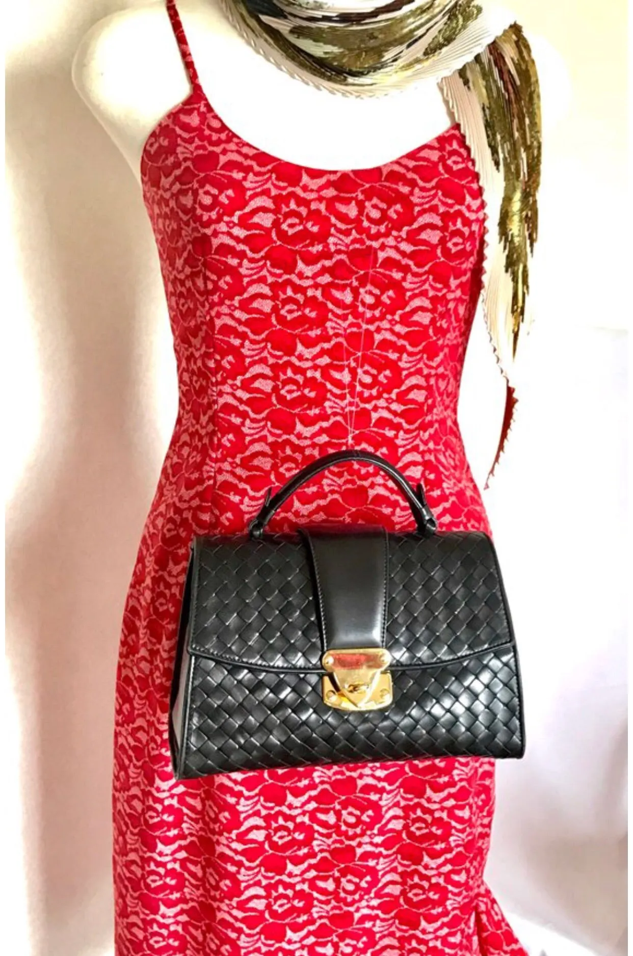 1990s. Vintage Bottega Veneta classic black lamb leather intrecciato handbag with golden closure hock. Gorgeous masterpiece from Bottega.